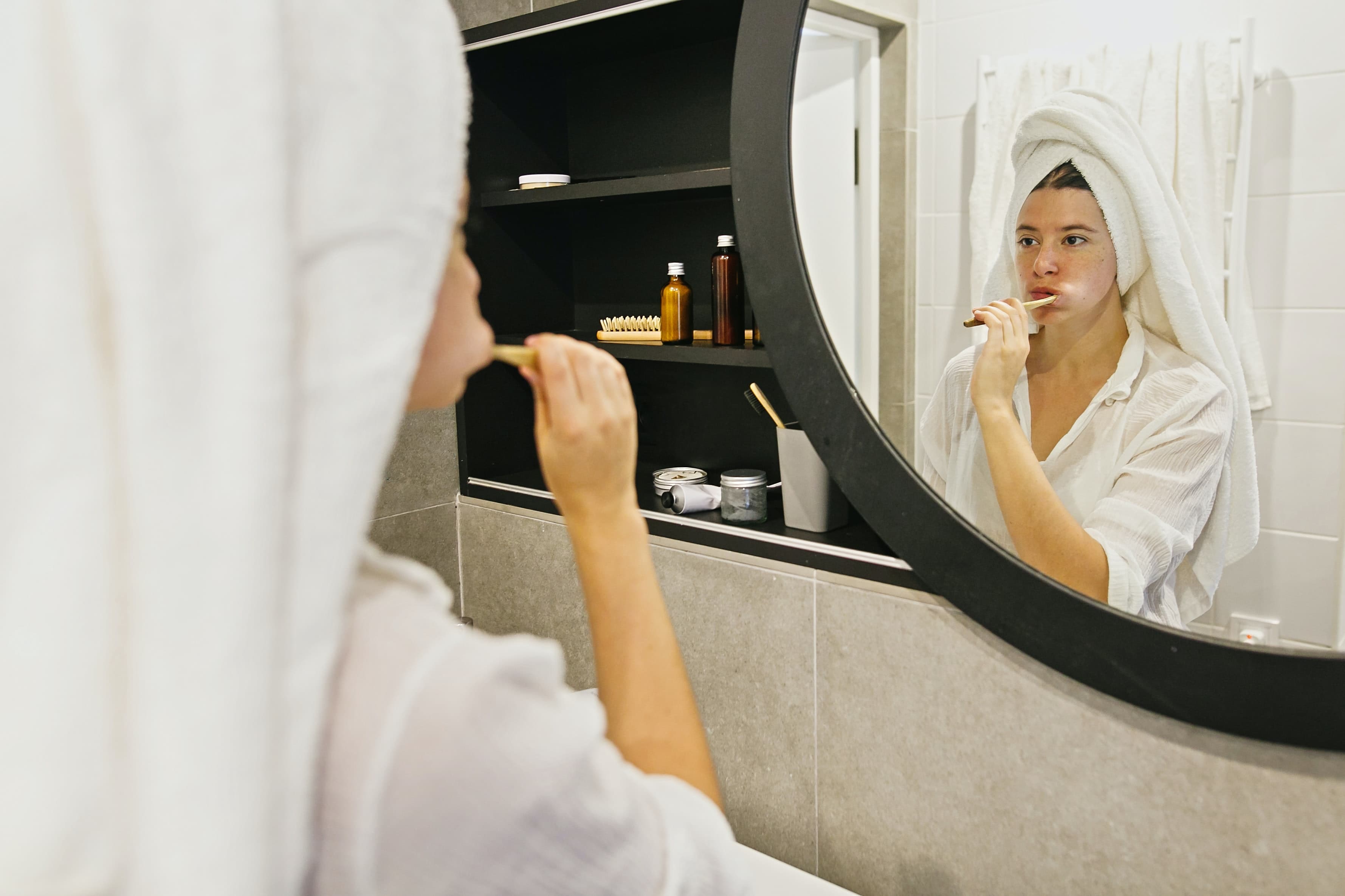 Woman brushing her teeth