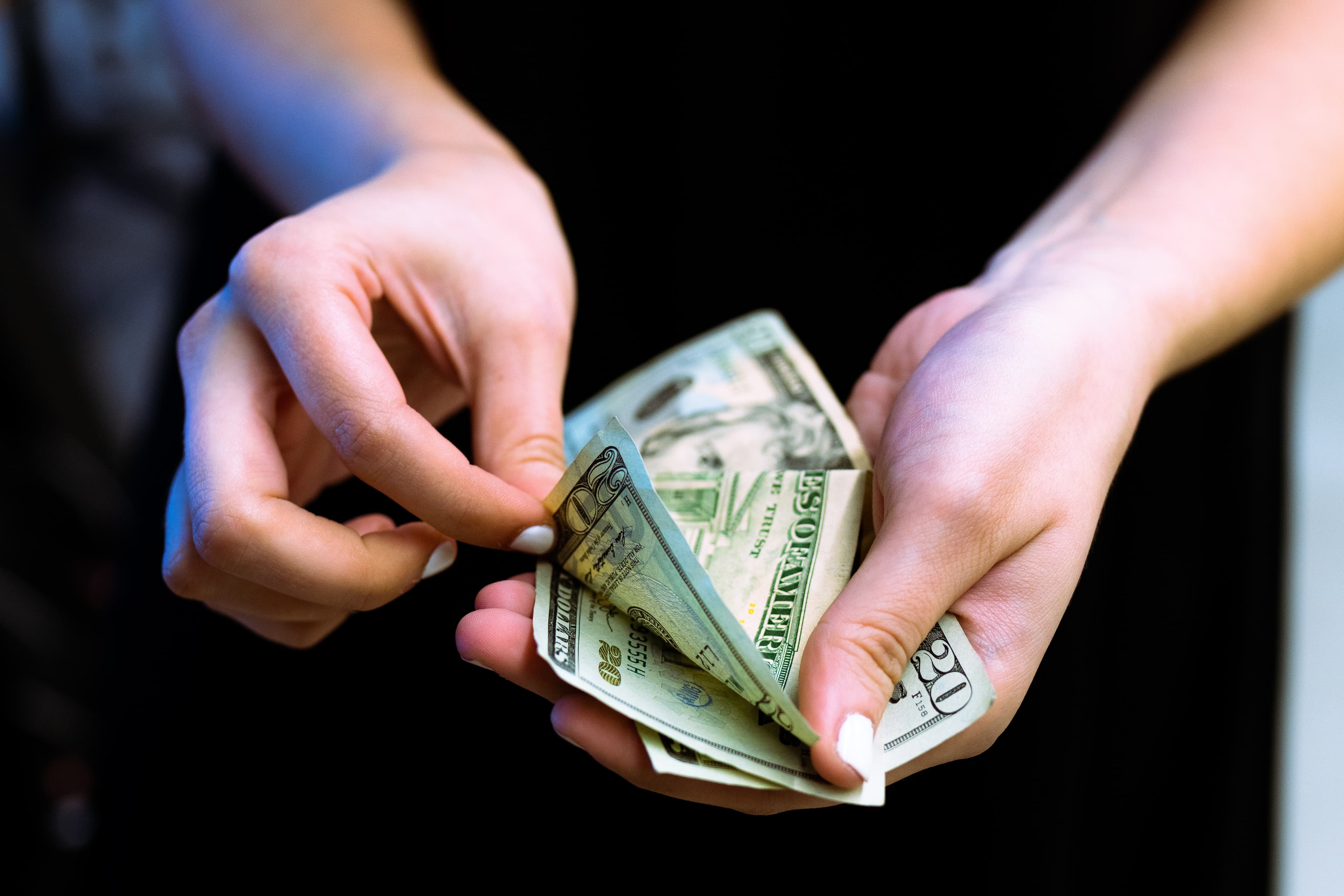 Person holding money