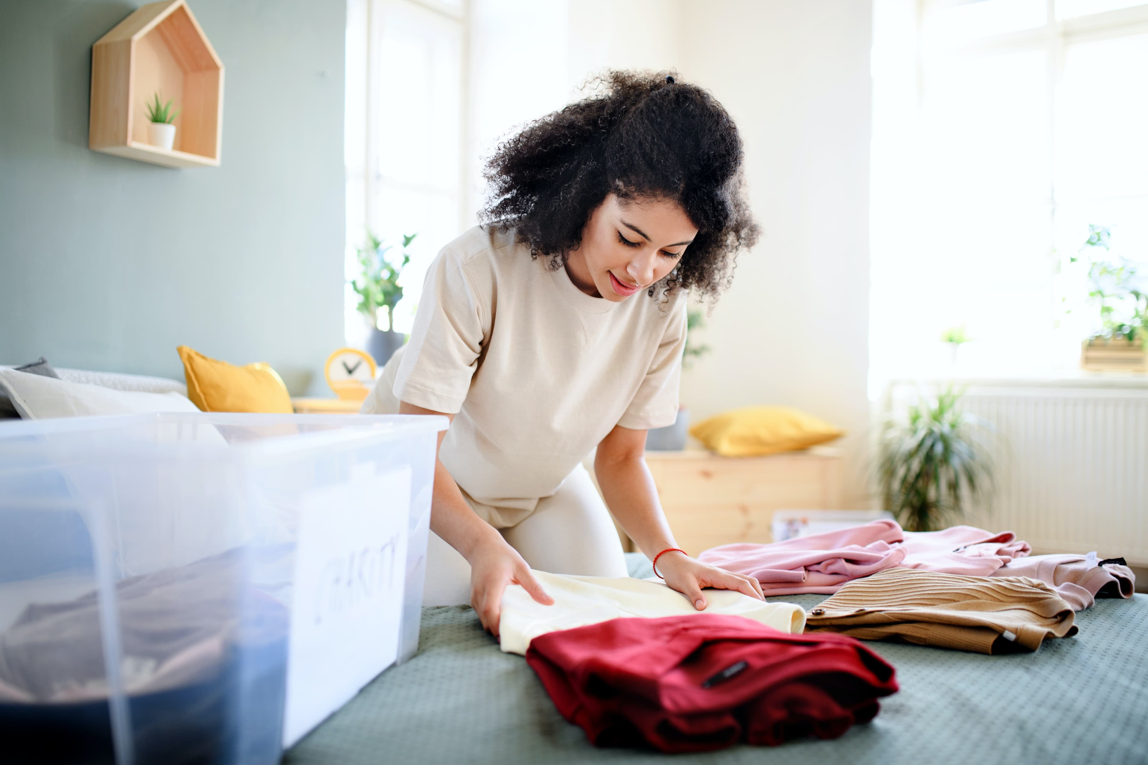 Woman looking through clothing on a rack